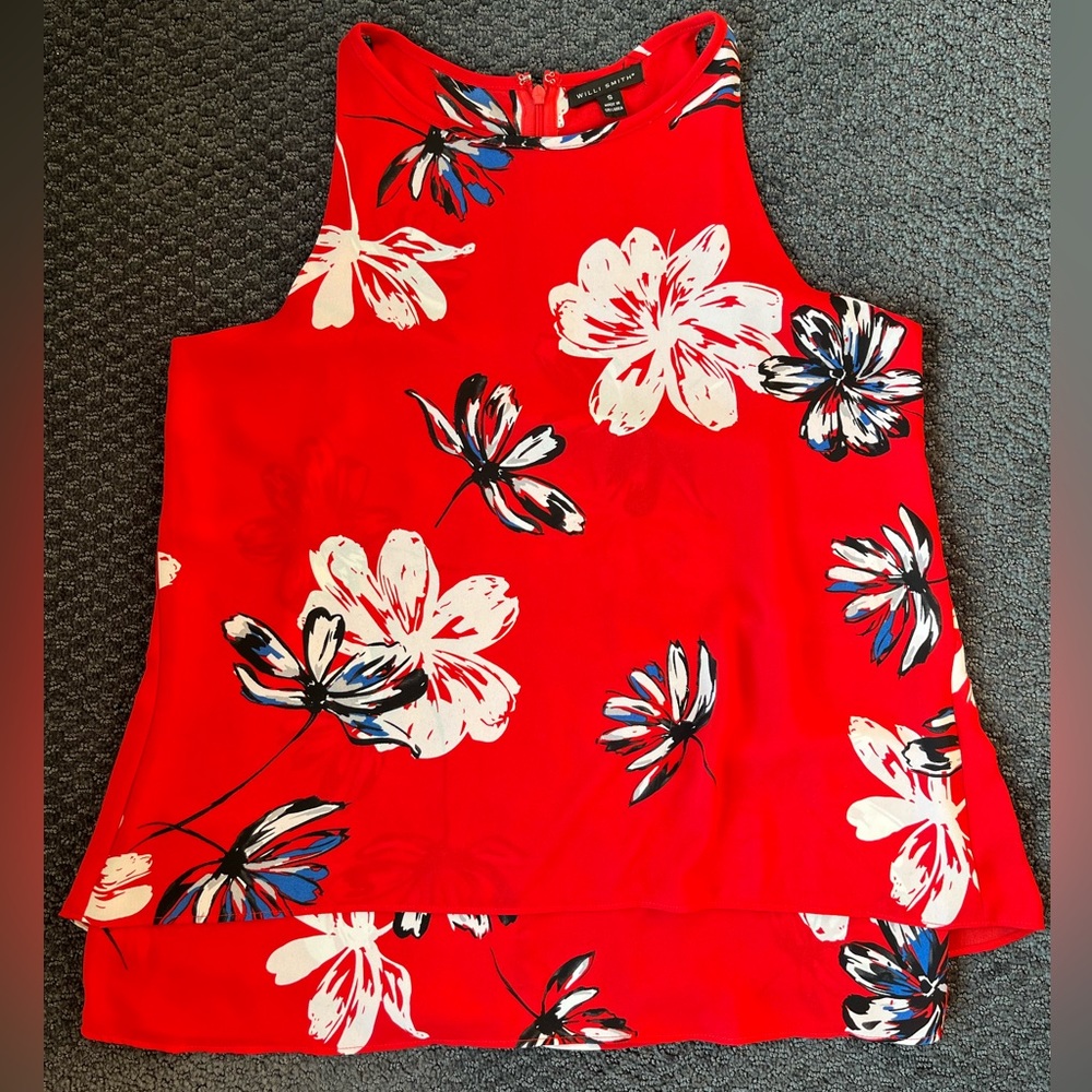 Sleeveless top with bright flower print